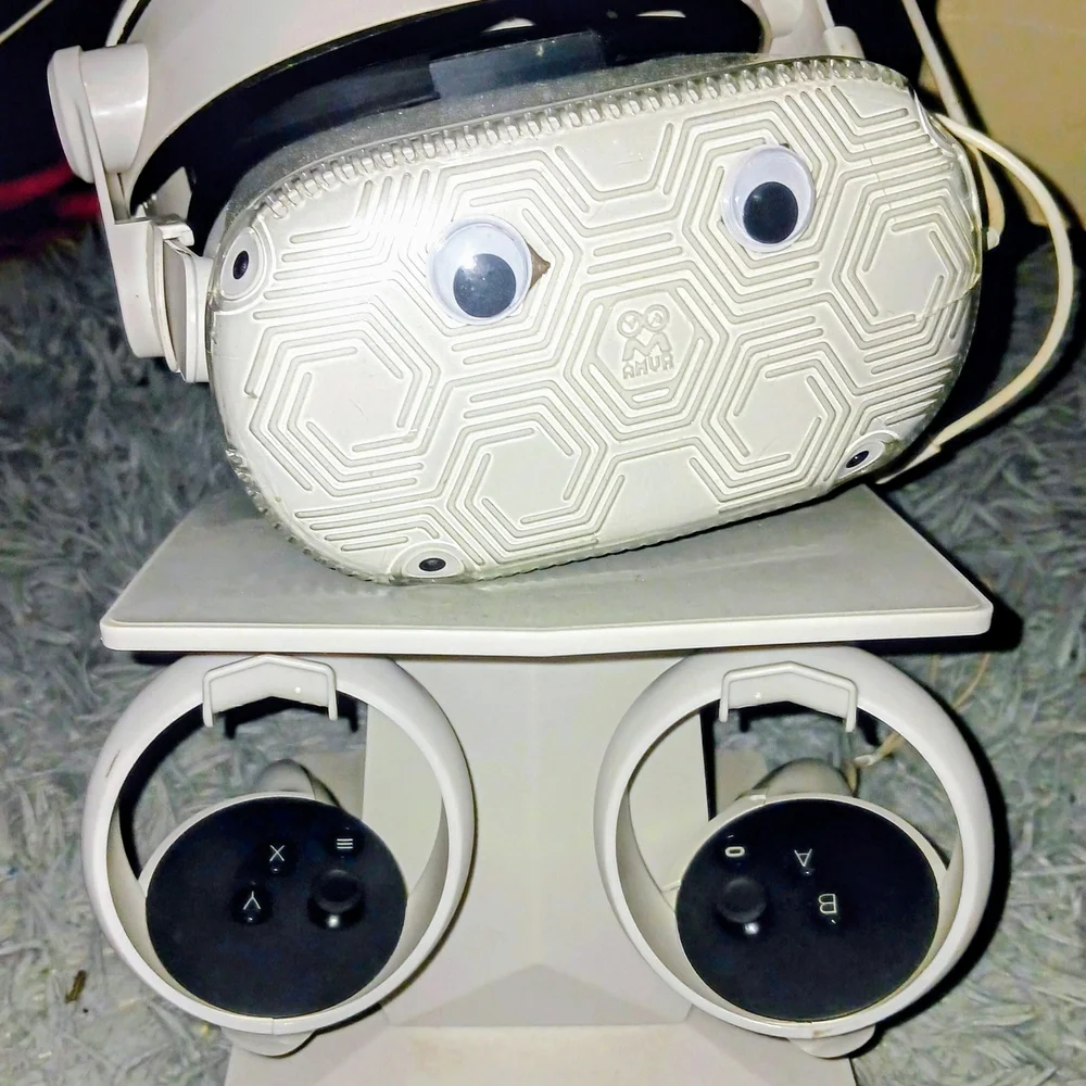 White VR Console with Adjustable Head Straps and Lens Covers